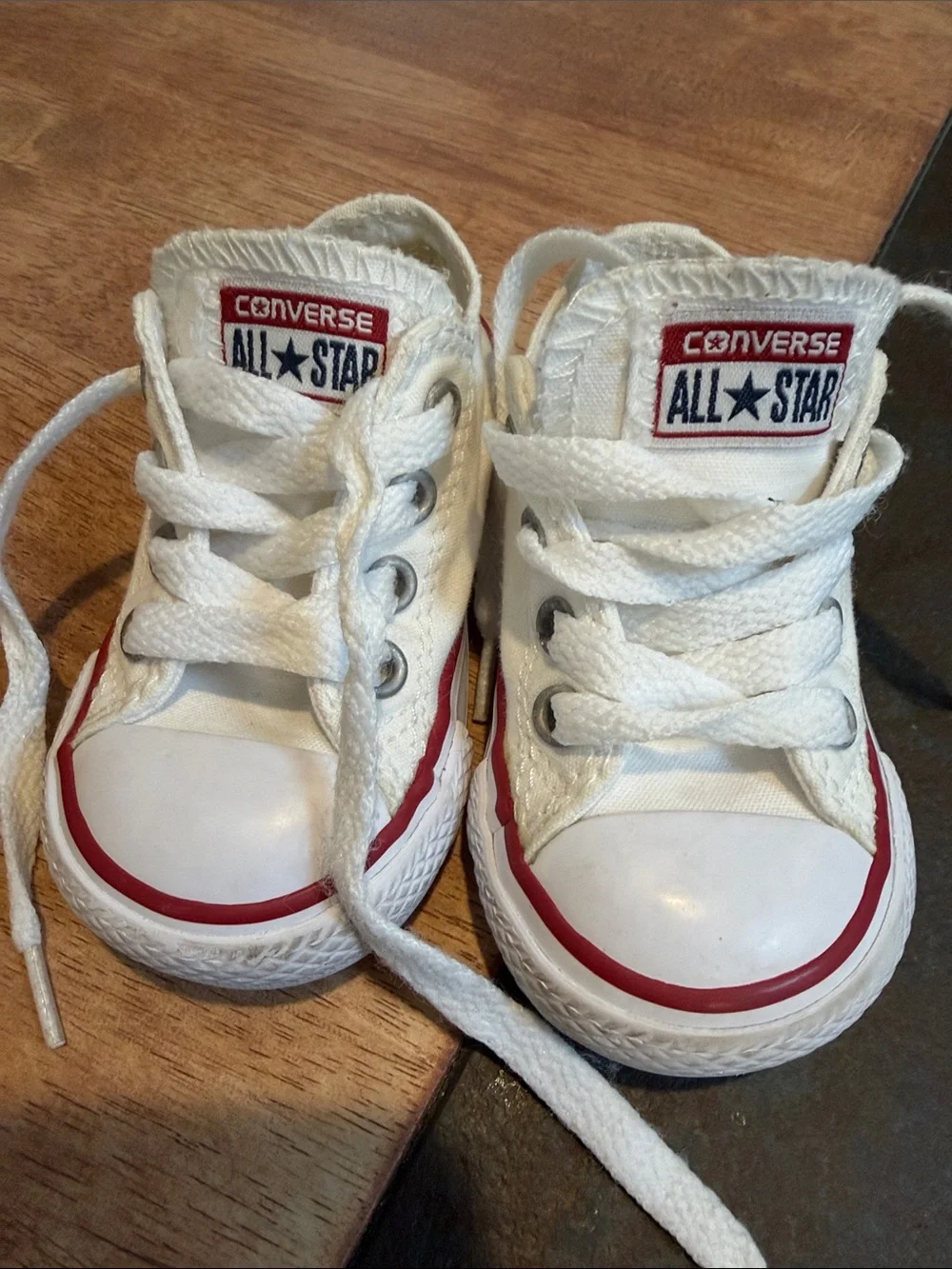 Converse White Low Top Sneakers with Red Trim